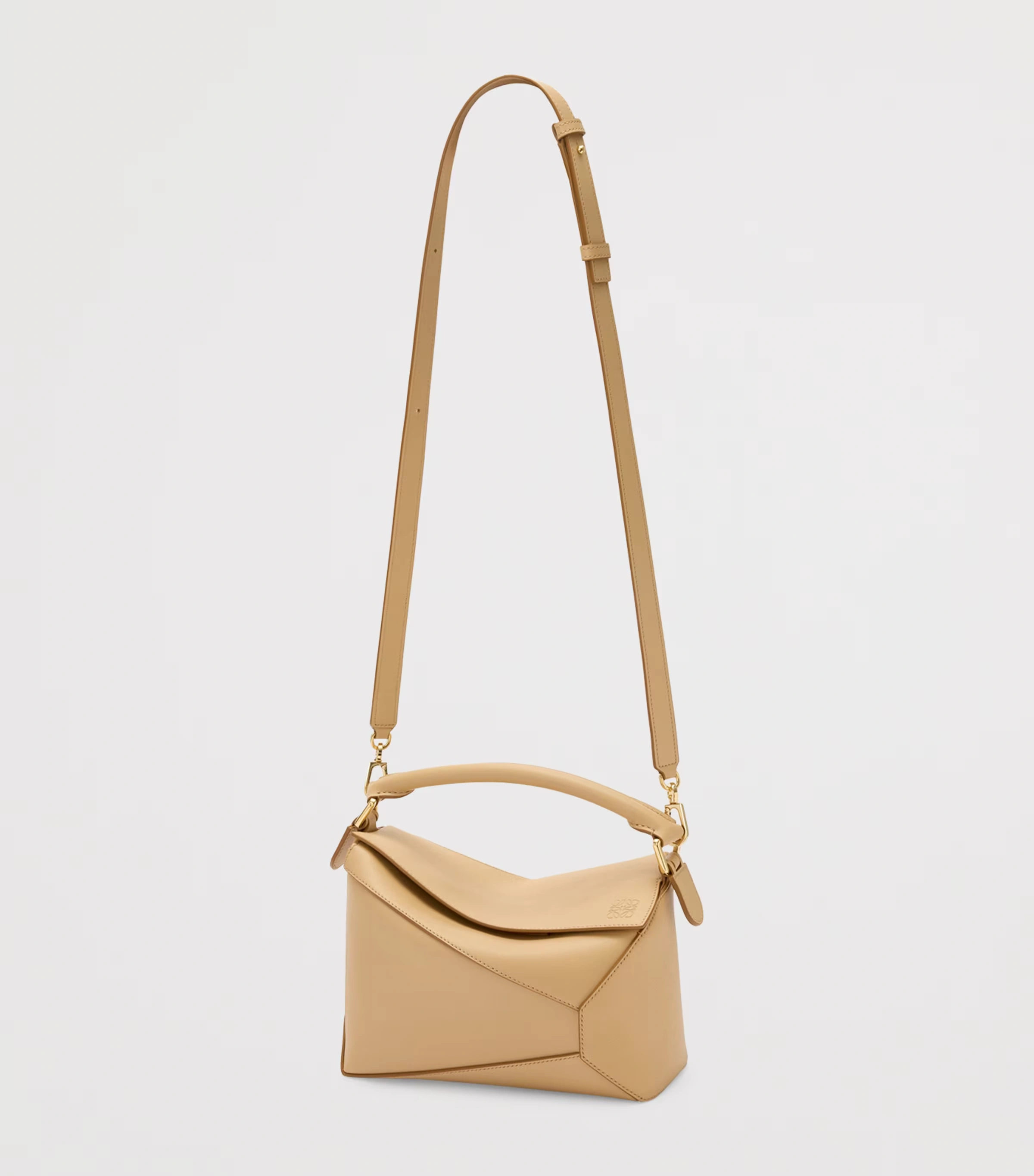 Small Leather Puzzle Edge Top-Handle Bag