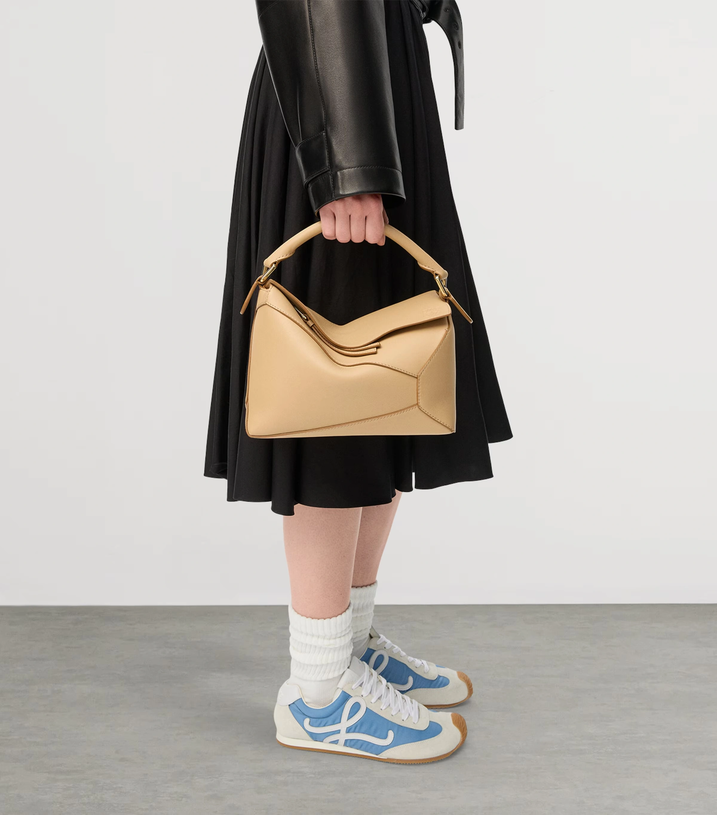 Small Leather Puzzle Edge Top-Handle Bag