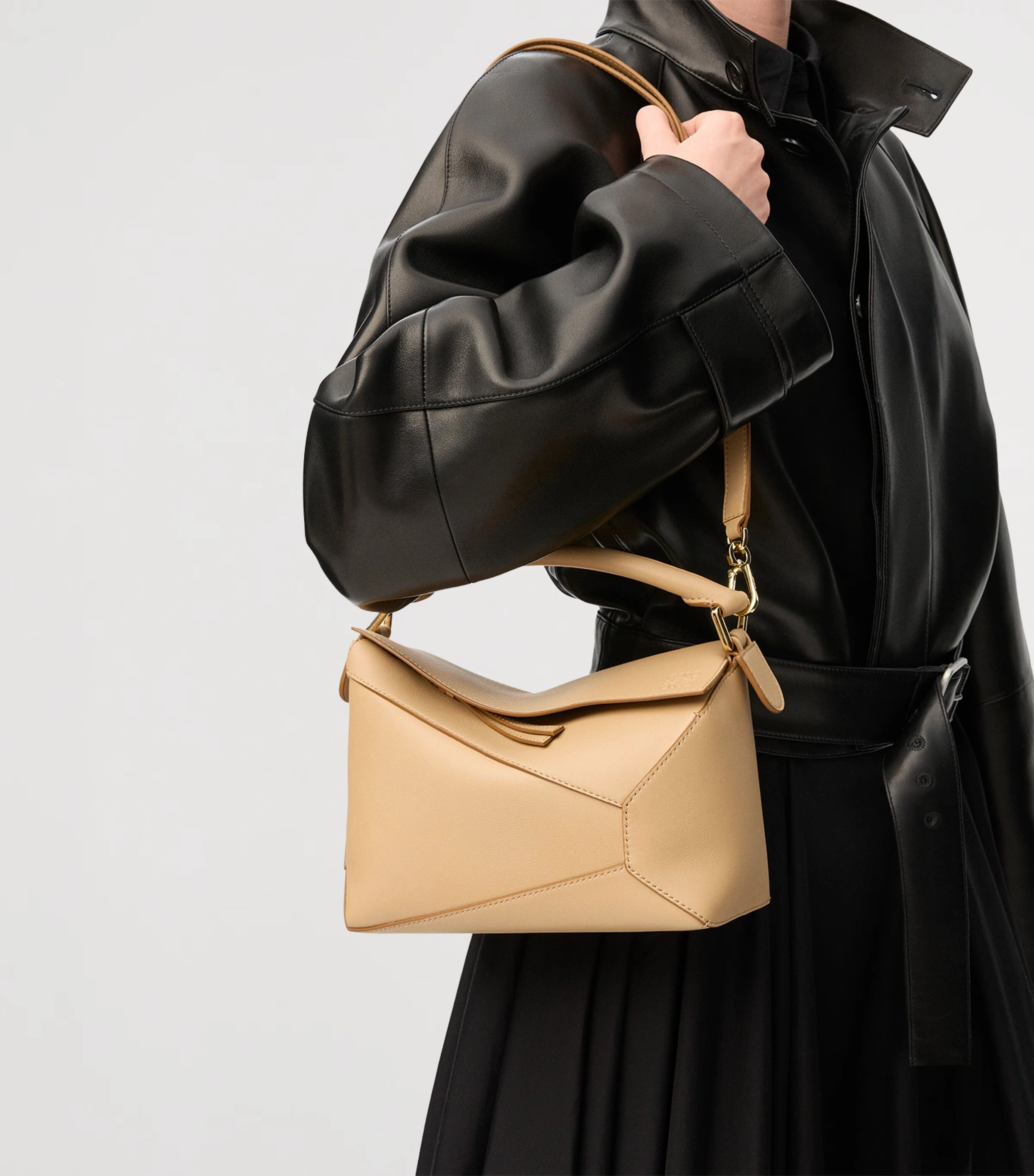 Small Leather Puzzle Edge Top-Handle Bag